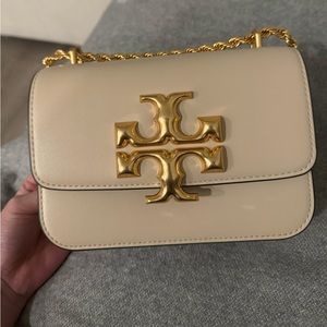 Tory Burch bag in creamy white.